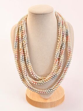 Multi-Strand Cream Bead Necklace with Pastel Rainbow Cord Layered